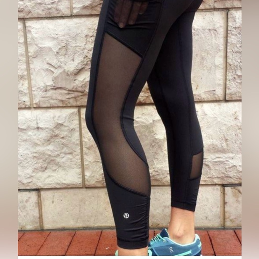 Lululemon leggings.  Seek the Heat black leggings with mesh detailing.